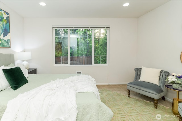 bedroom with light carpet, baseboards, and recessed lighting