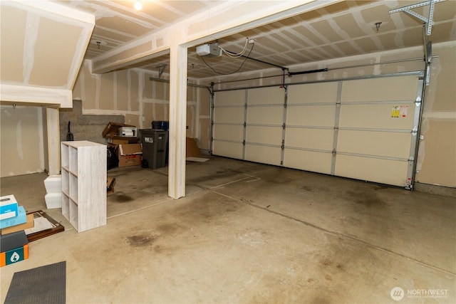 garage featuring a garage door opener