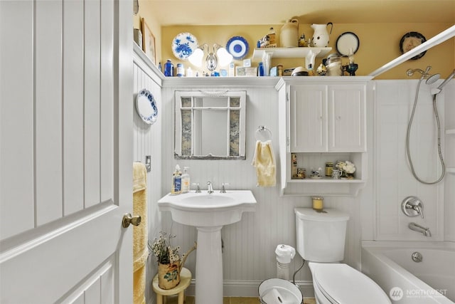 2124 213th Street Ct E, Spanaway, WA 98387 - bathroom featuring toilet, bathtub / shower combination, and a sink