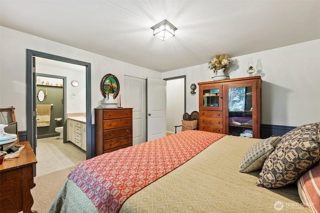 2124 213th Street Ct E, Spanaway, WA 98387 - bedroom featuring connected bathroom and light carpet