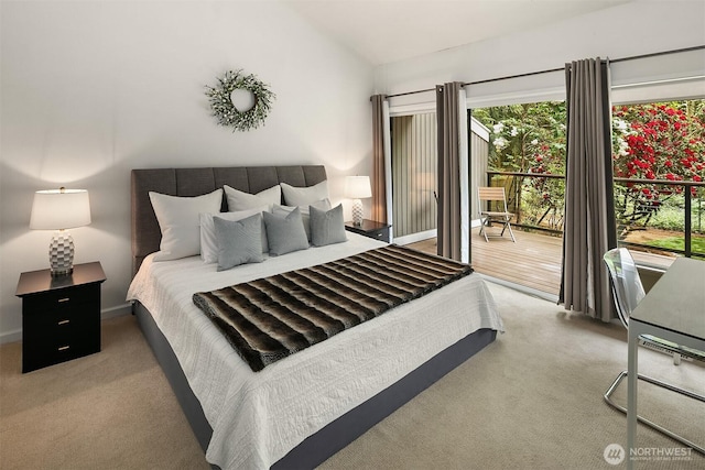 bedroom featuring access to exterior, lofted ceiling, and carpet floors