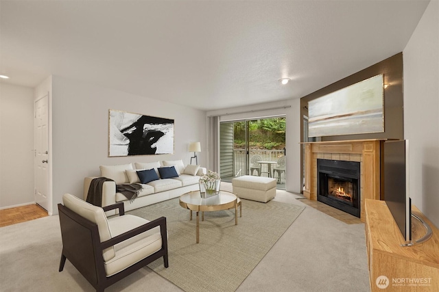 4106 Factoria Blvd SE Unit 216, Bellevue, WA 98006 - carpeted living room with a fireplace