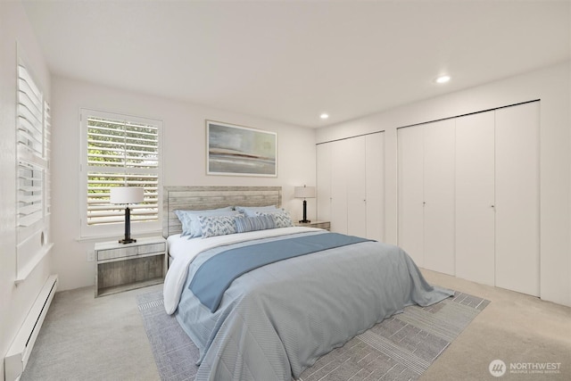 4106 Factoria Blvd SE Unit 216, Bellevue, WA 98006 - bedroom featuring light carpet, baseboard heating, two closets, and recessed lighting