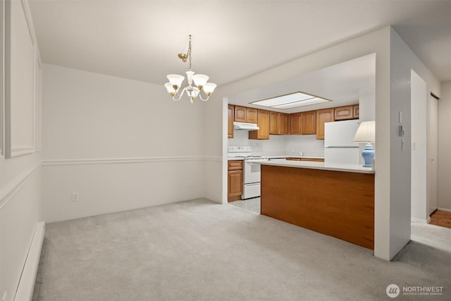 4106 Factoria Blvd SE Unit 216, Bellevue, WA 98006 - kitchen with white appliances, a baseboard heating unit, under cabinet range hood, a chandelier, and light colored carpet