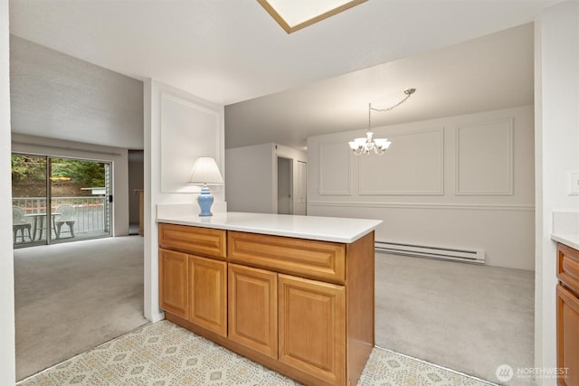 4106 Factoria Blvd SE Unit 216, Bellevue, WA 98006 - kitchen featuring light carpet, a baseboard heating unit, a peninsula, and light countertops