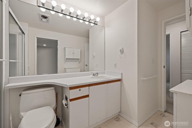 4106 Factoria Blvd SE Unit 216, Bellevue, WA 98006 - bathroom with vanity, toilet, and baseboards