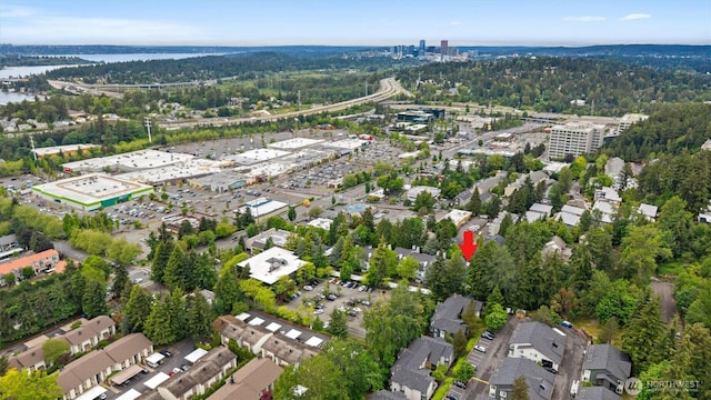 4106 Factoria Blvd SE Unit 216, Bellevue, WA 98006 - aerial view of property and surrounding area featuring a heavily wooded area