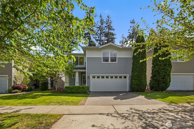 traditional-style house featuring driveway, an attached garage, and a front lawn