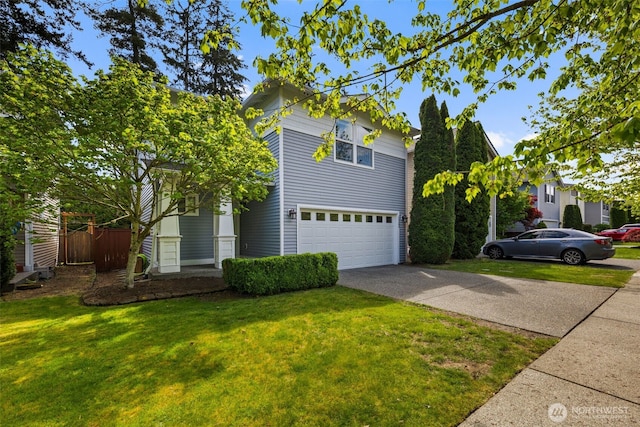 traditional-style house with a garage and driveway