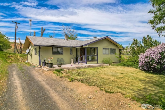 12623 Douglas Rd, Yakima, WA 98908 - view of front of house with covered porch and dirt driveway
