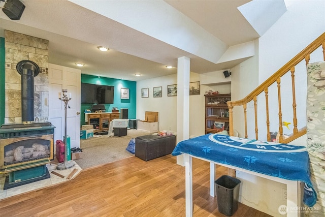 12623 Douglas Rd, Yakima, WA 98908 - playroom featuring a wood stove and wood finished floors