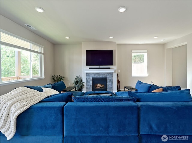 9932 15th Pl SE, Lake Stevens, WA 98258 - living room with a lit fireplace and recessed lighting