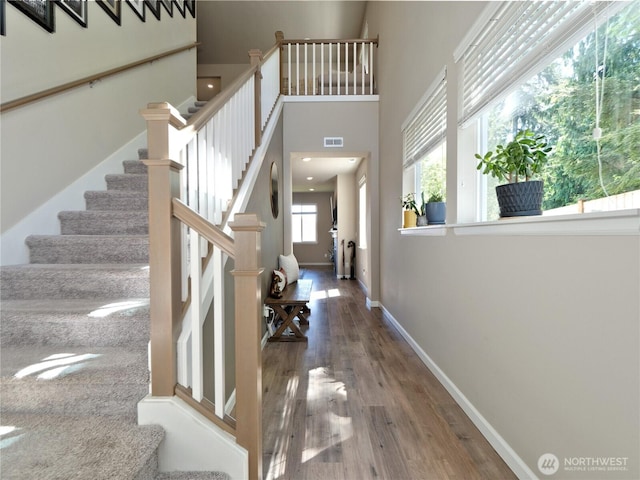 9932 15th Pl SE, Lake Stevens, WA 98258 - staircase with wood finished floors, baseboards, and recessed lighting