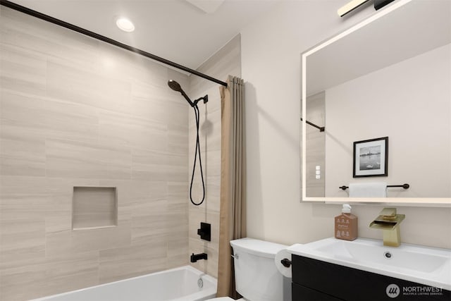 full bathroom featuring toilet, shower / washtub combination, and vanity