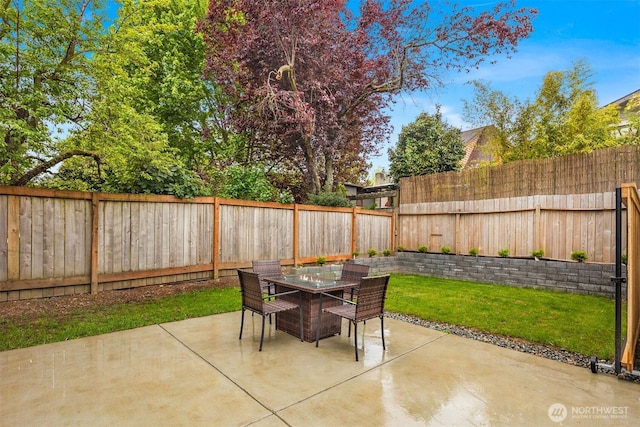 view of patio with outdoor dining area