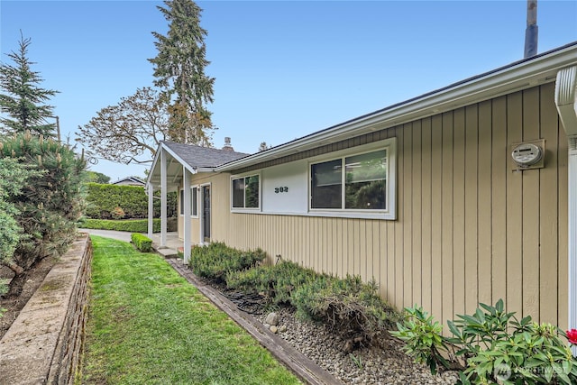 view of property exterior featuring a yard