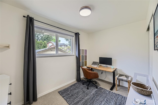 home office with carpet flooring and baseboards