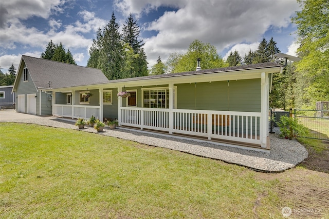 13520 Burn Rd, Arlington, WA 98223 - view of front of house with covered porch, a garage, and driveway
