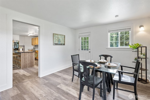 13520 Burn Rd, Arlington, WA 98223 - dining area with light wood finished floors and baseboards