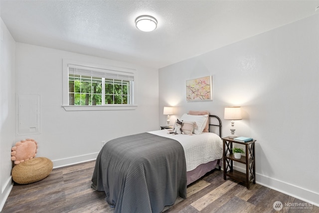 13520 Burn Rd, Arlington, WA 98223 - bedroom featuring wood finished floors and baseboards