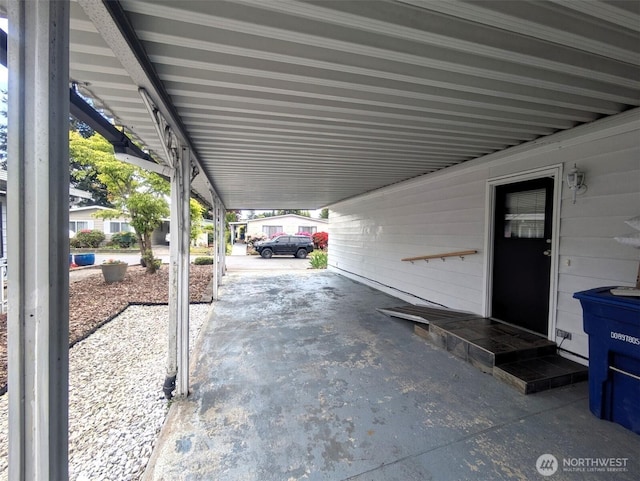 201 Union Ave SE Unit 136, Renton, WA 98059 - view of patio / terrace with a carport