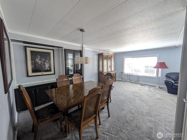 201 Union Ave SE Unit 136, Renton, WA 98059 - carpeted dining area with a textured ceiling, ornamental molding, and baseboards