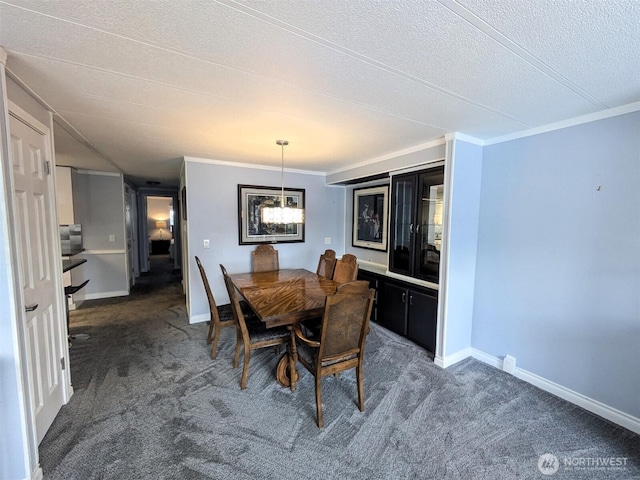 201 Union Ave SE Unit 136, Renton, WA 98059 - carpeted dining room featuring ornamental molding, a textured ceiling, and baseboards