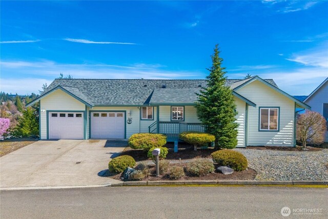 1166 Daniels Ave, Bremerton, WA 98312 - single story home featuring an attached garage, covered porch, concrete driveway, and a shingled roof