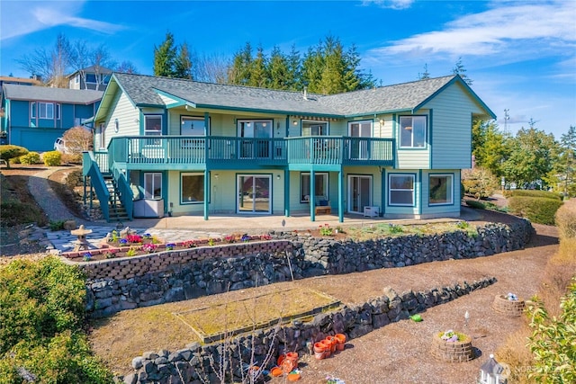 1166 Daniels Ave, Bremerton, WA 98312 - rear view of property featuring stairs, a patio, a deck, and roof with shingles