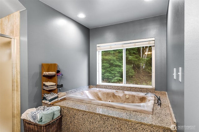 7819 Tolt River Rd NE, Carnation, WA 98014 - bathroom with a whirlpool tub, recessed lighting, and a shower with door