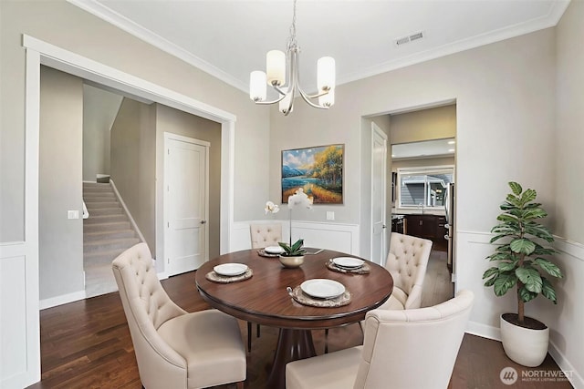 17702 SE 265th Ct, Covington, WA 98042 - dining room with a chandelier, dark wood finished floors, stairway, and crown molding