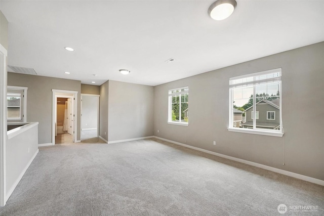 17702 SE 265th Ct, Covington, WA 98042 - unfurnished bedroom with light colored carpet and recessed lighting