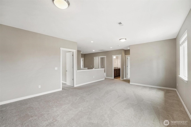 17702 SE 265th Ct, Covington, WA 98042 - unfurnished living room featuring light carpet and baseboards