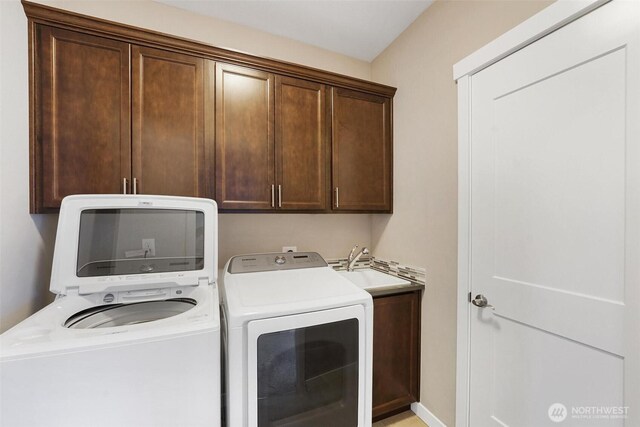 17702 SE 265th Ct, Covington, WA 98042 - washroom with cabinet space and washer and dryer