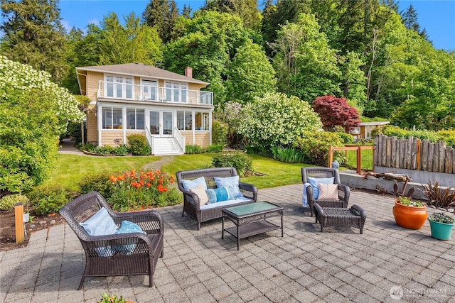 14010 SW Bates Rd, Vashon, WA 98070 - view of patio / terrace with a balcony, french doors, and outdoor lounge area