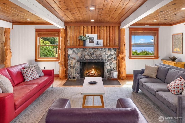 14010 SW Bates Rd, Vashon, WA 98070 - living area with wood finished floors, a fireplace, wooden ceiling, wood walls, and recessed lighting