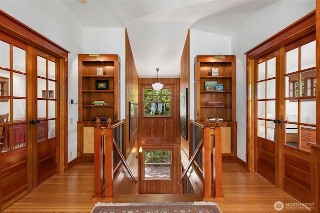 14010 SW Bates Rd, Vashon, WA 98070 - dining area featuring french doors, light wood-style floors, and baseboards