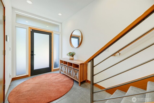 14016 30th Ave NE, Seattle, WA 98125 - entrance foyer with stairs, recessed lighting, finished concrete floors, and baseboards