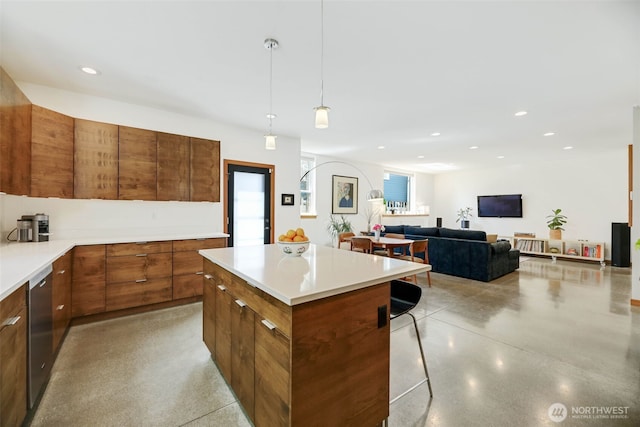 14016 30th Ave NE, Seattle, WA 98125 - kitchen featuring modern cabinets, a kitchen bar, brown cabinetry, a center island, and light countertops