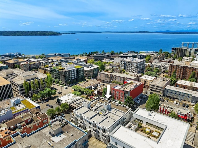 view of urban area featuring a nearby body of water