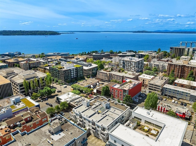 view of urban area with a large body of water