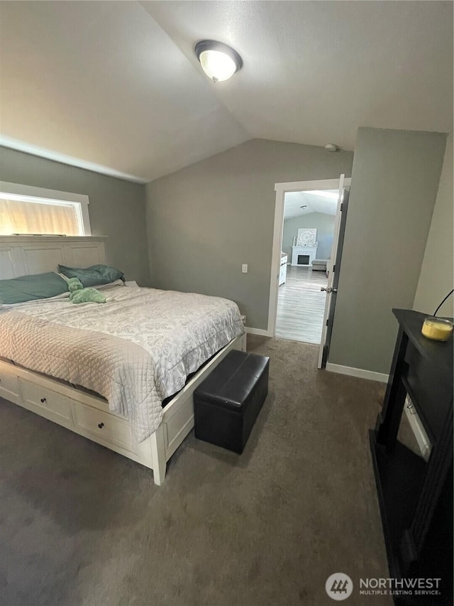 5600 Mt Solo Rd Unit 114, Longview, WA 98632 - bedroom featuring dark colored carpet and vaulted ceiling