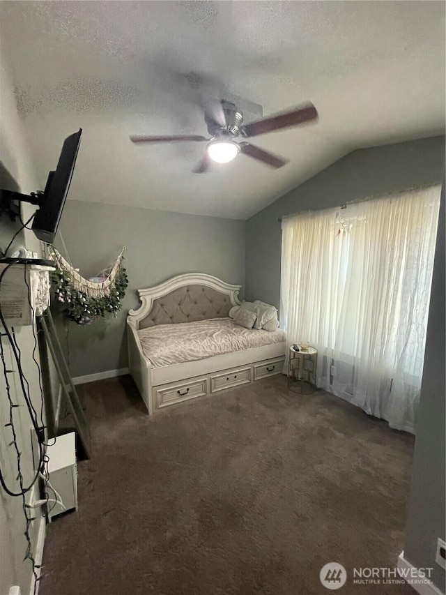 5600 Mt Solo Rd Unit 114, Longview, WA 98632 - carpeted bedroom featuring lofted ceiling, ceiling fan, and a textured ceiling