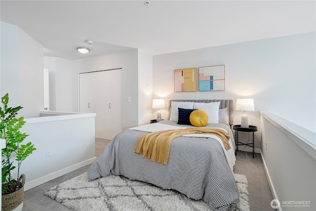 2415 2nd Ave Unit 743, Seattle, WA 98121 - carpeted bedroom featuring baseboards