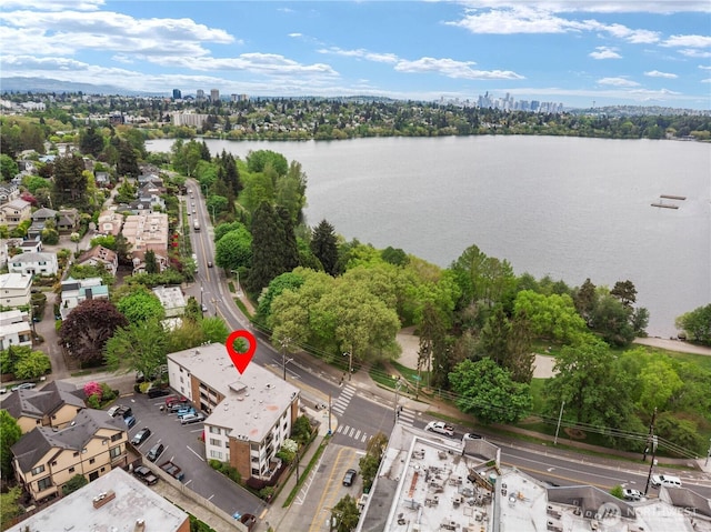 view of urban area with a large body of water