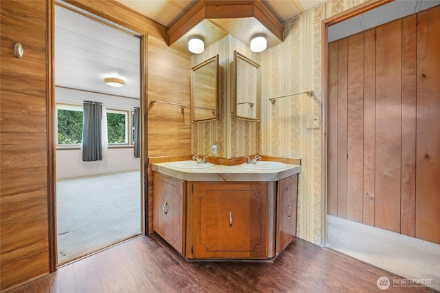 212 Old Owen Rd Unit 46, Sultan, WA 98294 - full bath featuring wood finished floors, double vanity, and wood walls