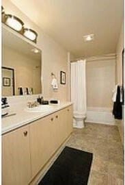 full bath featuring double vanity