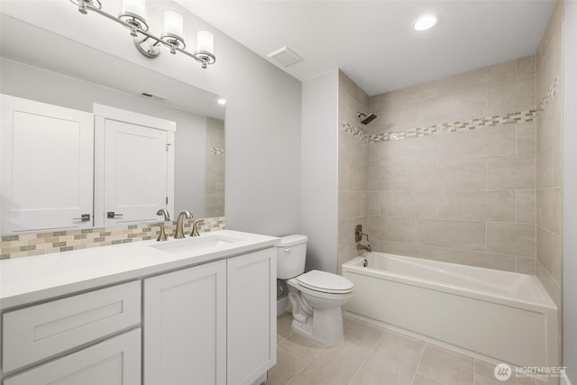 full bathroom featuring toilet, vanity, shower / bath combination, tile patterned floors, and recessed lighting