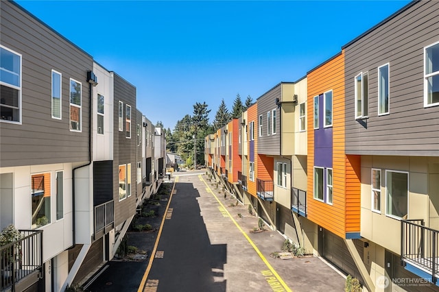 view of community featuring a residential view and an attached garage