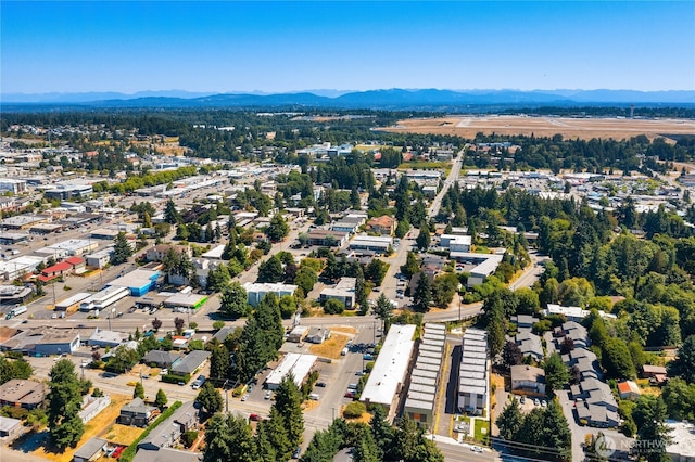 aerial view of property's location featuring mountains